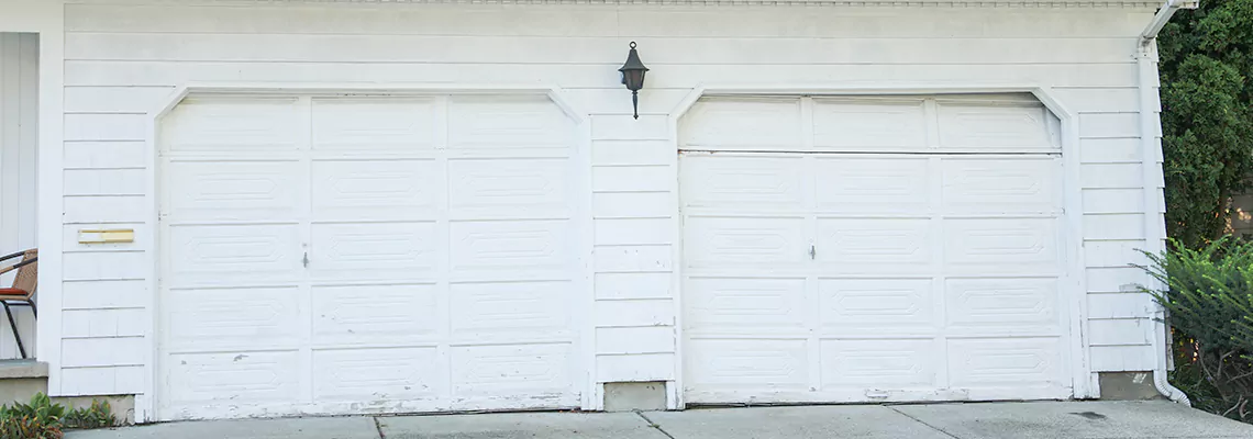 Roller Garage Door Dropped Down Replacement in Titusville, FL