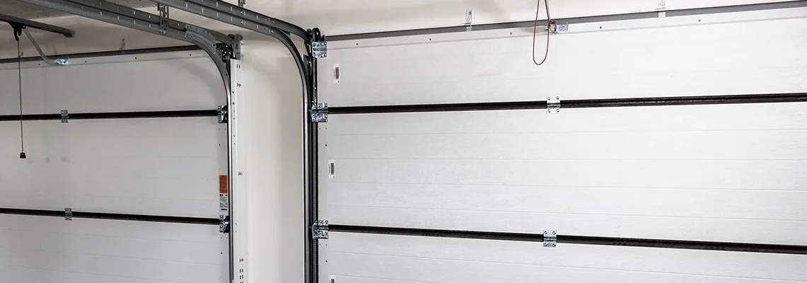 Fix Folding Garage Door Jerking in Titusville, Florida