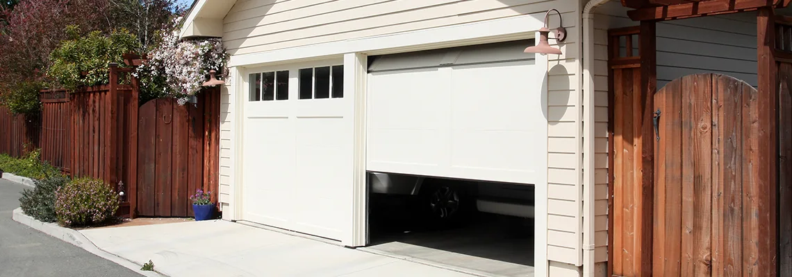 Fix Metal Garage Door Jerking in Titusville, Florida